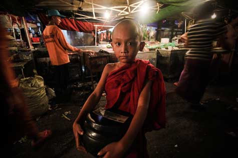 The monks go for alms in Yangon